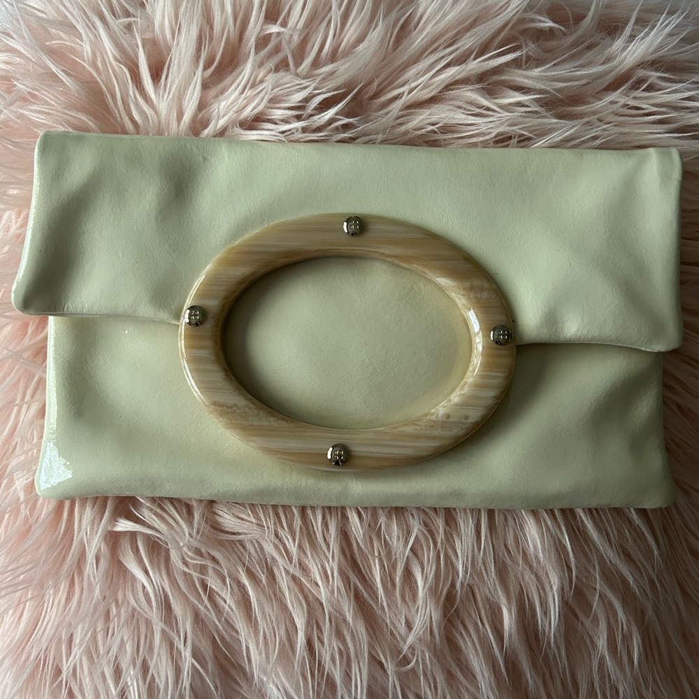 KATE SPADE PATENT FOLD OVER CLUTCH